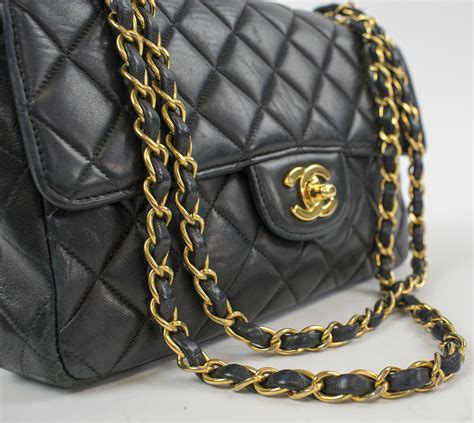 chanel bag black gold chain|chanel black bags classic quilted.